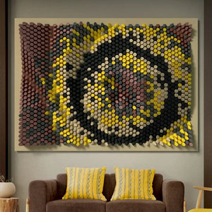 Modern living room with a decorative DIY 3D paper wall art piece above a sofa. 