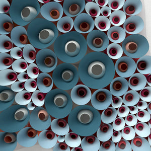 DIY paper folding project with repeating cone elements creating modern 3D wall decor inspired by natural patterns.
