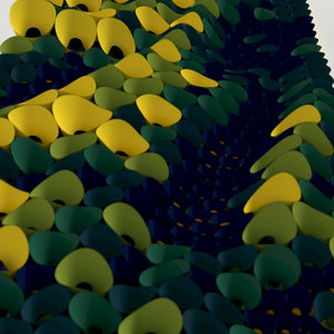 Trypophobia-inspired paper folding wall art made from folded cones forming an organic porous surface pattern.