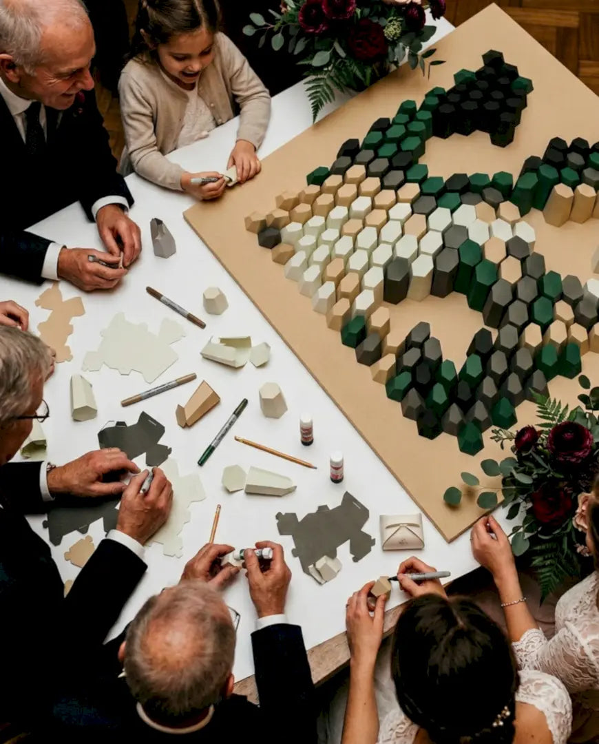 Wedding guests folding paper wall art blocks together, Paragami