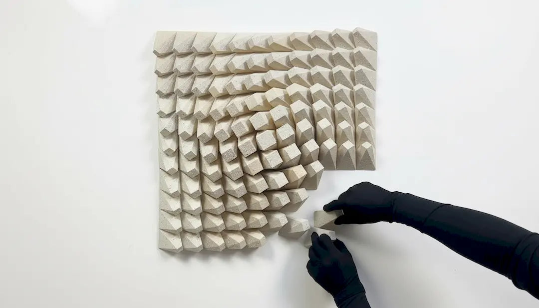 Twisted Box — 3D printed geometric wall art being assembled, stone-look finish, Paragami