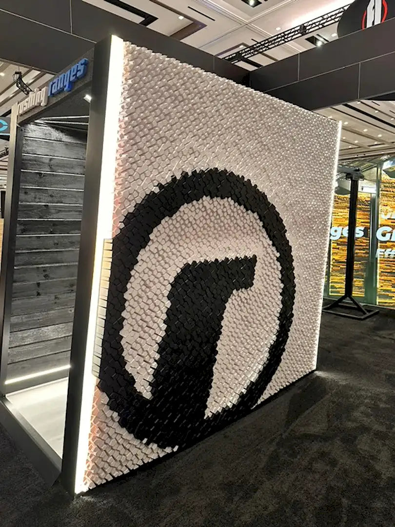 Rushing Ranges logo wall mosaic at the SHOT Show 2025 booth